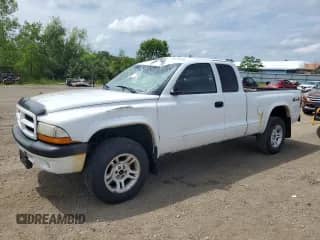 2003 Dodge Dakota Sport z VIN 1D7HG32NX3S345172, wystawiony jako Copart lot #65775335 z przebiegiem 169 253 mil mil oraz Szkoda całkowita • Salvage title. Historia ofert i sprzedaży dostępna na DreamBid. Obrazek 1.