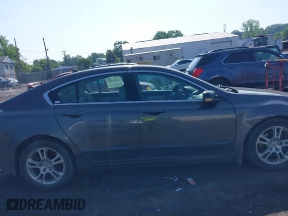✅ 2010 Acura TL • VIN: 19UUA8F24AA026992 • Lot: 42556488. Listed on IAAI with 230,591 mi. Free auction sales archive from the USA and detailed vehicle history report at DreamBid. Image 13.