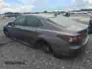 2023 Toyota Camry Hybrid LE with VIN 4T1C31AK3PU608653, listed as a Copart auction lot 59235965 with 57,095 mi miles and Clean title. Bid and sale history available at DreamBid. Image 2.