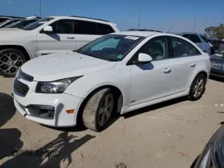✅ 2015 Chevrolet Cruze LT • VIN: 1G1PE5SBXF7103849 • Lot: 40605673. Listed on Copart with 96,616 mi. Free auction sales archive from the USA and detailed vehicle history report at DreamBid. Image 1.