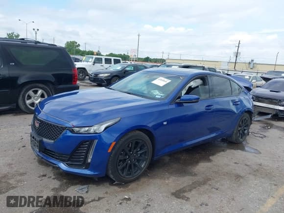 ✅ 2023 Cadillac CT5 Luxury • VIN: 1G6DW5RK2P0113186 • Lot: 42099816. Listed on IAAI with 37,530 mi. Free auction sales archive from the USA and detailed vehicle history report at DreamBid. Image 2.