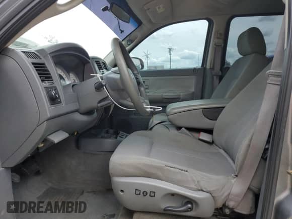 2006 Dodge Dakota SLT с VIN 1D7HE48KX6S526138, выставлен на аукционе Copart как лот 81651565 с пробегом 152 813 миль миль и Списание • Salvage title. История ставок и продаж доступна на DreamBid. Изображение 7.