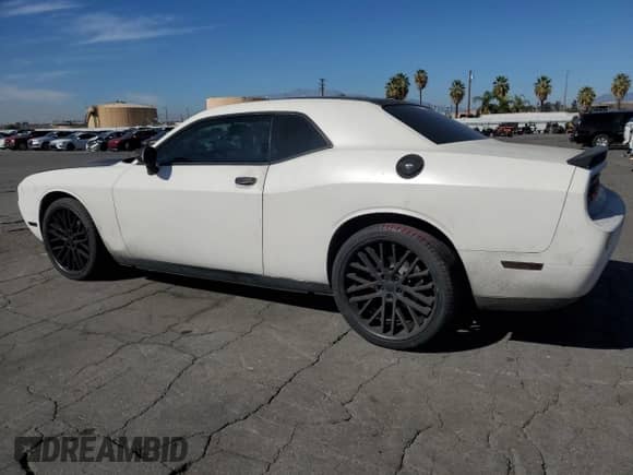 2013 Dodge Challenger SXT z VIN 2C3CDYAG5DH649553, wystawiony jako Copart lot #90937935 z przebiegiem 141 237 mil mil oraz Czysty tytuł • Clean title. Historia ofert i sprzedaży dostępna na DreamBid. Obrazek 2.