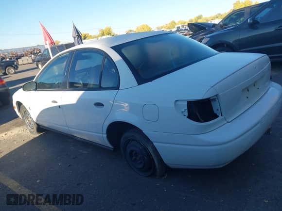 2001 Saturn SL with VIN 1G8ZF528X1Z228973, listed as a IAAI auction lot 43582331 with Not provided miles and . Bid and sale history available at DreamBid. Image 3.