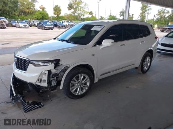 ✅ 2021 Cadillac XT6 Luxury • VIN: 1GYKPAR49MZ219681 • Lot: 43330800. Listed on IAAI with 47,907 mi. Free auction sales archive from the USA and detailed vehicle history report at DreamBid. Image 2.