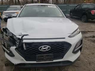 2018 Hyundai Kona SE z VIN KM8K1CAA1JU095785, wystawiony jako Copart lot #70176452 z przebiegiem 68 075 mil mil oraz . Historia ofert i sprzedaży dostępna na DreamBid. Obrazek 5.