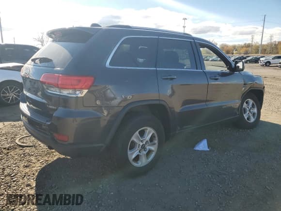 ✅ 2015 Jeep Grand Cherokee Laredo • VIN: 1C4RJFAG4FC793992 • Lot: 87296455. Listed on Copart with 234,821 mi. Free auction sales archive from the USA and detailed vehicle history report at DreamBid. Image 3.