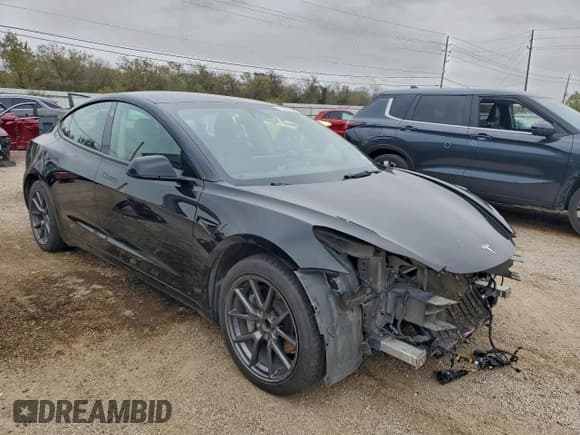 ✅ 2022 Tesla Model 3 • VIN: 5YJ3E1EA5NF186262 • Lot: 95076875. Listed on Copart with 147,074 mi. Free auction sales archive from the USA and detailed vehicle history report at DreamBid. Image 4.
