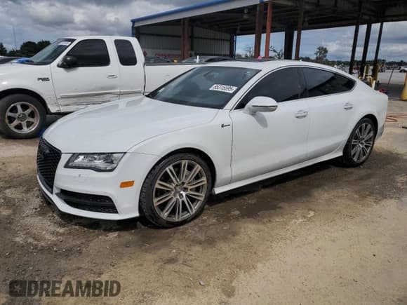 ✅ 2014 Audi A7 Prestige • VIN: WAU2GAFC4EN025454 • Lot: 85315595. Listed on Copart with 115,229 mi. Free auction sales archive from the USA and detailed vehicle history report at DreamBid. Image 1.