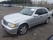 ✅ 2000 Mercedes-Benz C 230 Kompressor • VIN: WDBHA24G3YA833329 • Lot: 41921683. Wystawiony na IAAI z przebiegiem 109 436 mil. Bezpłatny archiwum sprzedaży aukcyjnych z USA i szczegółowy raport historii pojazdu na DreamBid. Zdjęcie 2.