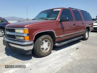 1999 Chevrolet Suburban с VIN 3GNEC16R2XG121506, выставлен на аукционе Copart как лот 63914415 с пробегом 211 042 миль миль и Списание • Salvage title. История ставок и продаж доступна на DreamBid. Изображение 1.