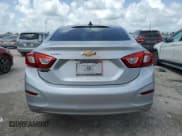 ✅ 2018 Chevrolet Cruze LS • VIN: 1G1BC5SM0J7103630 • Lot: 64805503. Listed on Copart with 124,430 mi. Free auction sales archive from the USA and detailed vehicle history report at DreamBid. Image 6.