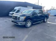 ✅ 2017 Nissan Titan Pro-4X • VIN: 1N6AA1E53HN559310 • Lot: 95930605. Listed on Copart with 117,343 mi. Free auction sales archive from the USA and detailed vehicle history report at DreamBid. Image 2.