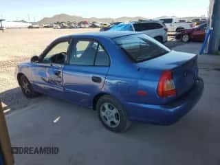 2002 Hyundai Accent GL with VIN KMHCG45C32U332833, listed as a Copart auction lot 66539644 with 69,763 mi miles and Salvage title. Bid and sale history available at DreamBid. Image 2.