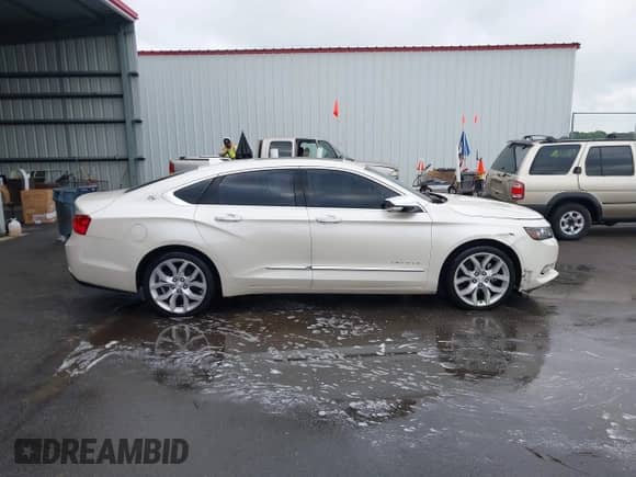 2014 Chevrolet Impala LTZ with VIN 1G1155S38EU105260, listed as a IAAI auction lot 42012082 with 230,407 mi miles and . Bid and sale history available at DreamBid. Image 13.