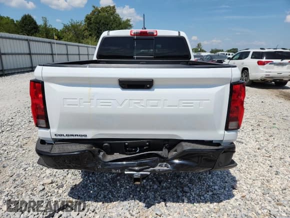 ✅ 2024 Chevrolet Colorado 4WD Trail Boss • VIN: 1GCPTEEK1R1307598 • Лот: 69098645. Опубликован ранее на Copart с пробегом 7 010 миль. Бесплатный доступ к архиву аукционных продаж из США и подробный отчёт об истории автомобиля на DreamBid. Изображение 6.