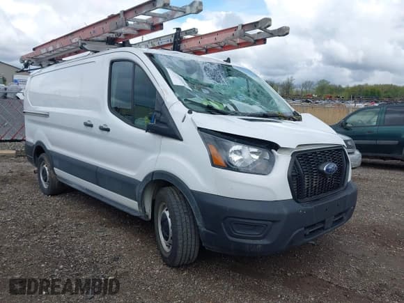 ✅ 2021 Ford Transit Cargo • VIN: 1FTYE1Y86MKA71783 • Lot: 42183454. Listed on IAAI with 53,405 mi. Free auction sales archive from the USA and detailed vehicle history report at DreamBid. Image 1.