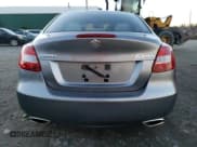 ✅ 2010 Suzuki Kizashi SE • VIN: JS2RE9A34A6100872 • Лот: 80420524. Опубликован ранее на Copart с пробегом 96 945 миль. Бесплатный доступ к архиву аукционных продаж из США и подробный отчёт об истории автомобиля на DreamBid. Изображение 6.