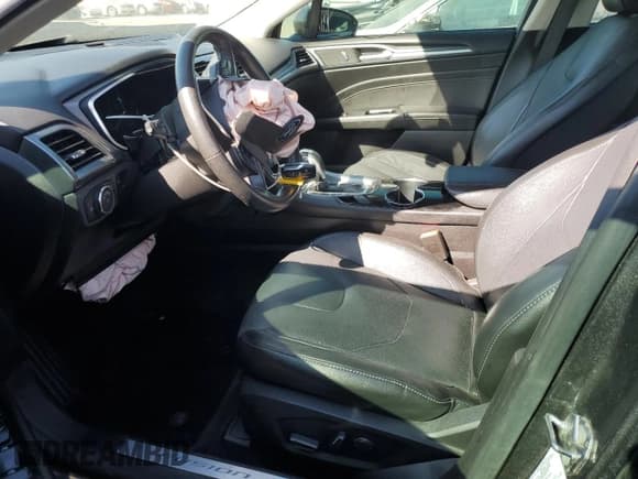 ✅ 2016 Ford Fusion Titanium Hybrid • VIN: 3FA6P0RU4GR125580 • Лот: 70785425. Опубликован ранее на Copart с пробегом 105 472 миль. Бесплатный доступ к архиву аукционных продаж из США и подробный отчёт об истории автомобиля на DreamBid. Изображение 7.