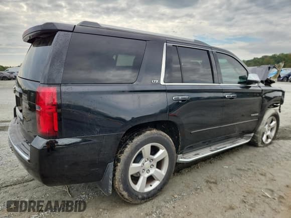 ✅ 2015 Chevrolet Tahoe LTZ • VIN: 1GNSCCKC9FR229653 • Lot: 83984825. Listed on Copart with 169,955 mi. Free auction sales archive from the USA and detailed vehicle history report at DreamBid. Image 3.