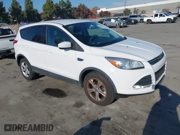 ✅ 2013 Ford Escape SE • VIN: 1FMCU9GX9DUC87292 • Lot: 43837293. Listed on IAAI with 140,103 mi. Free auction sales archive from the USA and detailed vehicle history report at DreamBid. Image 1.