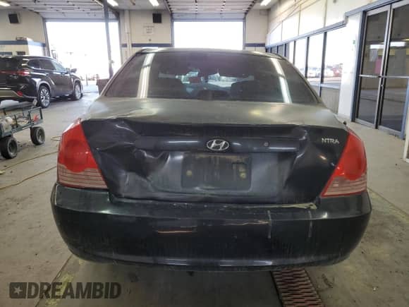 2005 Hyundai Elantra GLS z VIN KMHDN46D95U932682, wystawiony jako Copart lot #75063804 z przebiegiem Nie podano mil oraz Szkoda całkowita • Salvage title. Historia ofert i sprzedaży dostępna na DreamBid. Obrazek 6.