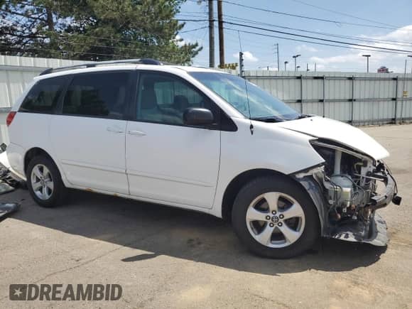 2009 Toyota Sienna LE with VIN 5TDBK23C19S023009, listed as a Copart auction lot 56470755 with 285,574 mi miles and Salvage title. Bid and sale history available at DreamBid. Image 4.