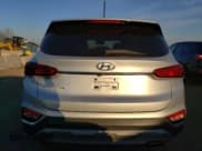 ✅ 2019 Hyundai Santa Fe SE • VIN: 5NMS23AD6KH035389 • Lot: 41792173. Listed on Copart with 58,901 mi. Free auction sales archive from the USA and detailed vehicle history report at DreamBid. Image 6.