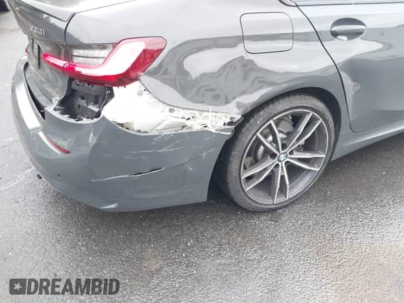 2022 BMW 3 Series 330i xDrive with VIN WBA5R7C05NFM16689, listed as a IAAI auction lot 42530938 with 56,777 mi miles and . Bid and sale history available at DreamBid. Image 6.