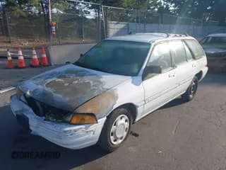 ✅ 1996 Ford Escort LX • VIN: 1FASP15J8TW140509 • Лот: 40345084. Опубликован ранее на IAAI с пробегом 146 295 миль. Бесплатный доступ к архиву аукционных продаж из США и подробный отчёт об истории автомобиля на DreamBid. Изображение 2.