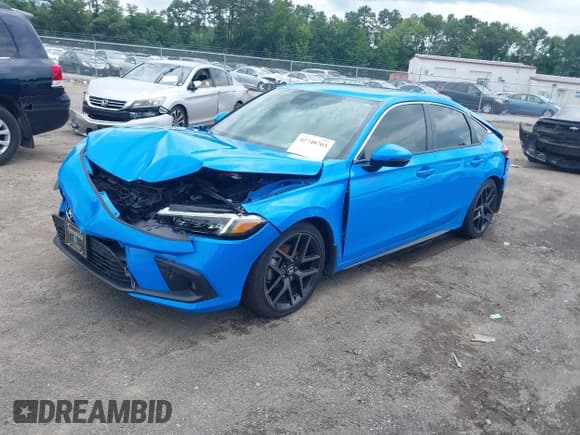 ✅ 2024 Honda Civic Sport Touring • VIN: 19XFL1G85RE019716 • Lot: 42748703. Wystawiony na IAAI z przebiegiem 5 879 mil. Bezpłatny archiwum sprzedaży aukcyjnych z USA i szczegółowy raport historii pojazdu na DreamBid. Zdjęcie 17.