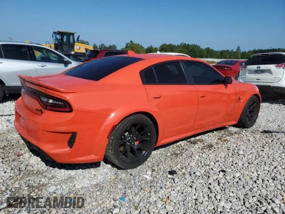 ✅ 2022 Dodge Charger SRT Hellcat Redeye Widebody • VIN: 2C3CDXL9XNH101459 • Lot: 67074044. Wystawiony na Copart z przebiegiem 10 701 mil. Bezpłatny archiwum sprzedaży aukcyjnych z USA i szczegółowy raport historii pojazdu na DreamBid. Zdjęcie 3.