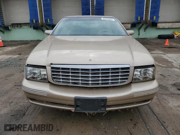 ✅ 1997 Cadillac DeVille • VIN: 1G6KD54Y5VU244028 • Lot: 86650584. Listed on Copart with 57,648 mi. Free auction sales archive from the USA and detailed vehicle history report at DreamBid. Image 5.