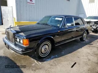 ✅ 1986 Rolls-Royce Silver Spur • VIN: SCAZN42A6GCX15256 • Lot: 73678214. Wystawiony na Copart z przebiegiem 44 128 mil. Bezpłatny archiwum sprzedaży aukcyjnych z USA i szczegółowy raport historii pojazdu na DreamBid. Zdjęcie 1.