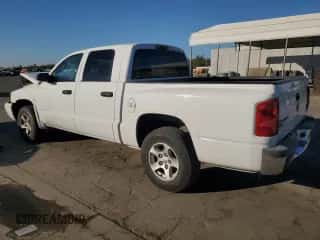 2006 Dodge Dakota SLT с VIN 1D7HE48N46S502721, выставлен на аукционе Copart как лот 77704414 с пробегом 195 514 миль миль и Списание • Salvage title. История ставок и продаж доступна на DreamBid. Изображение 2.