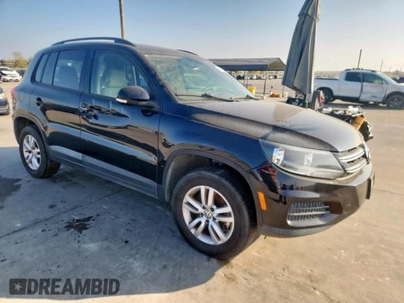 ✅ 2016 Volkswagen Tiguan S • VIN: WVGAV7AXXGW553137 • Lot: 93170055. Listed on Copart with 122,972 mi. Free auction sales archive from the USA and detailed vehicle history report at DreamBid. Image 4.