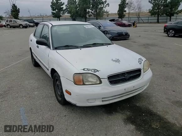 ✅ 2000 Suzuki Esteem GL • VIN: JS2GB41S3Y5190350 • Lot: 55014245. Wystawiony na Copart z przebiegiem 92 853 mil. Bezpłatny archiwum sprzedaży aukcyjnych z USA i szczegółowy raport historii pojazdu na DreamBid. Zdjęcie 13.