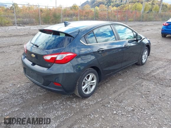 ✅ 2017 Chevrolet Cruze LT • VIN: 3G1BE6SM4HS516419 • Lot: 43594135. Listed on IAAI with 54,908 mi. Free auction sales archive from the USA and detailed vehicle history report at DreamBid. Image 4.