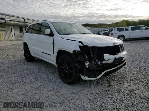 2018 Jeep Grand Cherokee Altitude z VIN 1C4RJFAG4JC397098, wystawiony jako Copart lot #82310585 z przebiegiem 138 914 mil mil oraz Szkoda całkowita • Salvage title. Historia ofert i sprzedaży dostępna na DreamBid. Obrazek 14.