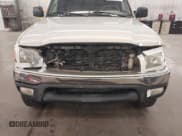 ✅ 2001 Toyota Tacoma PreRunner • VIN: 5TEGN92N51Z845148 • Lot: 42210630. Listed on IAAI with 387,766 mi. Free auction sales archive from the USA and detailed vehicle history report at DreamBid. Image 6.