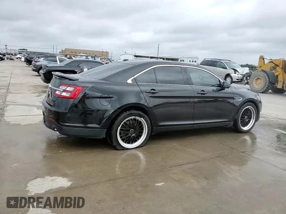 ✅ 2014 Ford Taurus SHO • VIN: 1FAHP2KT4EG106957 • Lot: 59364185. Listed on Copart with 113,704 mi. Free auction sales archive from the USA and detailed vehicle history report at DreamBid. Image 13.