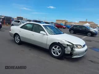 ✅ 2001 Lexus ES 300 • VIN: JT8BF28G710327189 • Lot: 42911574. Wystawiony na IAAI z przebiegiem 103 200 mil. Bezpłatny archiwum sprzedaży aukcyjnych z USA i szczegółowy raport historii pojazdu na DreamBid. Zdjęcie 1.