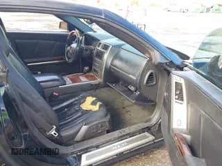 ✅ 2005 Cadillac XLR • VIN: 1G6YV34A155602458 • Lot: 43721615. Wystawiony na IAAI z przebiegiem 106 799 mil. Bezpłatny archiwum sprzedaży aukcyjnych z USA i szczegółowy raport historii pojazdu na DreamBid. Zdjęcie 5.