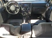 ✅ 2008 Jeep Wrangler Unlimited Sahara • VIN: 1J8GA591X8L575746 • Лот: 84580255. Опубликован ранее на Copart с пробегом 175 733 миль. Бесплатный доступ к архиву аукционных продаж из США и подробный отчёт об истории автомобиля на DreamBid. Изображение 8.