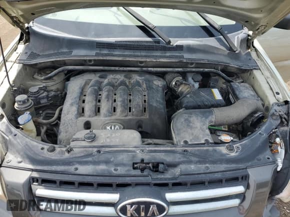 ✅ 2007 Kia Sportage EX • VIN: KNDJE723677353558 • Lot: 67818725. Listed on Copart with 191,366 mi. Free auction sales archive from the USA and detailed vehicle history report at DreamBid. Image 12.