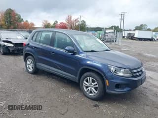 ✅ 2014 Volkswagen Tiguan S • VIN: WVGAV3AX7EW626163 • Lot: 43591364. Wystawiony na IAAI z przebiegiem 198 283 mil. Bezpłatny archiwum sprzedaży aukcyjnych z USA i szczegółowy raport historii pojazdu na DreamBid. Zdjęcie 1.
