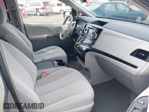 ✅ 2014 Toyota Sienna LE AAS • VIN: 5TDKK3DC0ES467867 • Lot: 42022676. Listed on IAAI with 99,959 mi. Free auction sales archive from the USA and detailed vehicle history report at DreamBid. Image 5.