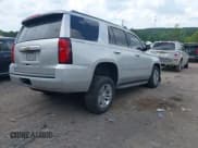 ✅ 2018 Chevrolet Tahoe LT • VIN: 1GNSCBKC3JR112590 • Lot: 42156796. Listed on IAAI with 124,120 mi. Free auction sales archive from the USA and detailed vehicle history report at DreamBid. Image 4.