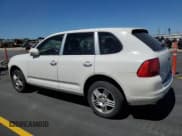 ✅ 2006 Porsche Cayenne • VIN: WP1AA29P36LA22013 • Лот: 58748915. Опубликован ранее на Copart с пробегом 164 710 миль. Бесплатный доступ к архиву аукционных продаж из США и подробный отчёт об истории автомобиля на DreamBid. Изображение 2.