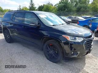 2020 Chevrolet Traverse Premier with VIN 1GNEVKKW4LJ271640, listed as a IAAI auction lot 43142039 with 80,483 mi miles and . Bid and sale history available at DreamBid. Image 1.